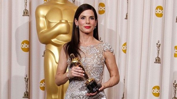 Sandra Bullock poses with the Oscar for Actress in a Leading Role for "The Blind Side" in the Press Room during the 82nd Academy Awards Sunday, March 7, 2010, in the Hollywood section of Los Angeles. (AP Photo/Matt Sayles)